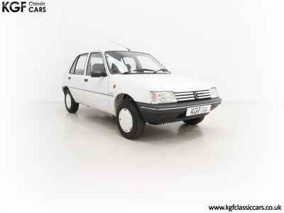 An Exceptional Peugeot 205 Junior with Only 15, 796 Miles from New